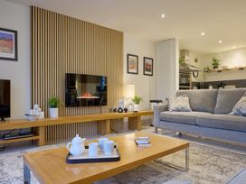 A living room with a sofa and coffee table at Riverside Park 1 in Keswick