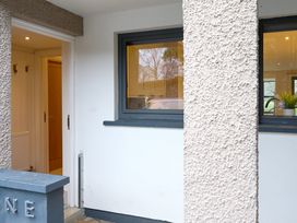 An entrance with a door and windows at Riverside Park 1 in Keswick