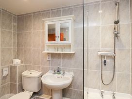 A bathroom with a sink and shower at Low Dow Crag in Coniston