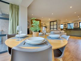 A dining room with a table set for meals at Riverside Park 3 in Keswick