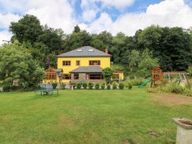 A house with garden and playground at The Woodlands Lower Level in Stepaside