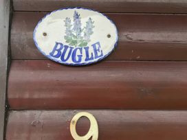 A sign with the name Bugle and house number 9 at Bugle in Saltburn-By-The-Sea