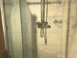 A shower with a showerhead and controls at Bugle Saltburn-By-The-Sea