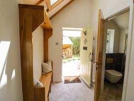 An entrance with a bench and an open door at Wyncliffe in Chipping Campden