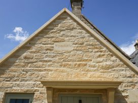 A stone building with a nameplate Wyncliffe at Wyncliffe in Chipping Campden