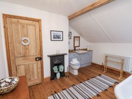 A bathroom with a sink and toilet at Charlotte House Whitby