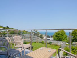 A balcony with seating and a view of the sea at 65 Channel View Ilfracombe