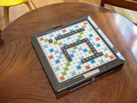 A scrabble board with letters on a table at Y Graiglwyd Bull Bay near Amlwch