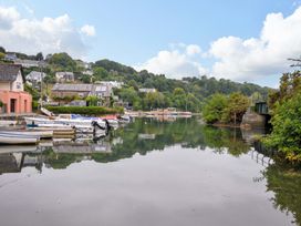 A waterfront view with boats and houses at Island House in Golant near Tywardreath
