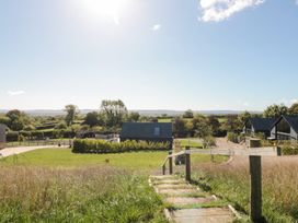 A landscape view of houses and trees at Foxes Den in Allerston near Thornton Dale