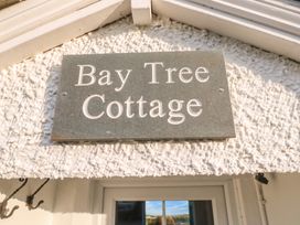 A nameplate that reads Bay Tree Cottage