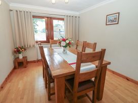A dining room with a table and chairs at Summerseat in Kirkby Stephen