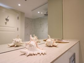 A bathroom with shells on a countertop at Villa 1, Estura in Salcombe