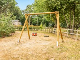 A swing set in a garden at High House in Southrepps