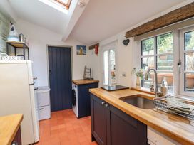 A kitchen with a sink and countertop at Preswylfa in Ffestiniog