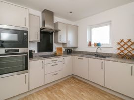 A kitchen with modern appliances and countertop at The Lookout