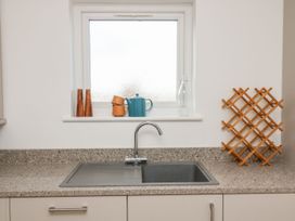 A kitchen with a sink and window at The Lookout