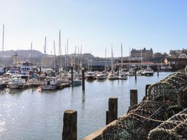 A marina with boats and fishing nets at The Lookout in 