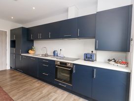 A kitchen with cabinets and countertop at Durbyfield in Nottington near Weymouth