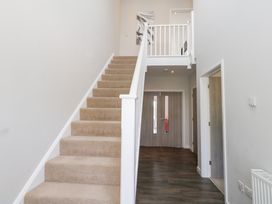 A staircase and hallway at Corvesgate in Nottington near Weymouth