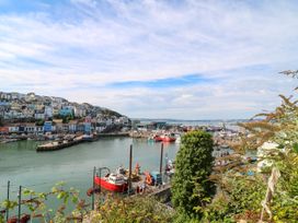 A harbor view with boats and buildings at Bay View in Brixham