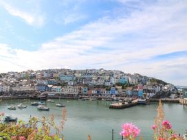 A harbor with boats and houses at Bay View in Brixham