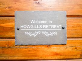 A welcome sign at Howgills Retreat Gatebeck near Kirkby Lonsdale