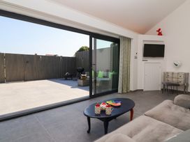 A living room with a view of the terrace at Ninky Nonk in Bristol