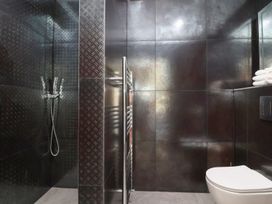 A bathroom with a shower and toilet at Ninky Nonk Bristol
