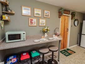 A kitchen with a microwave and countertop at Country Retreat in Ponteland