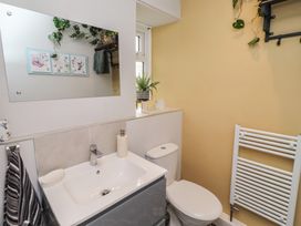 A bathroom with a sink and toilet at Country Retreat in Ponteland