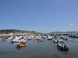 A view of boats at a harbor at Seaside in Lyme Regis