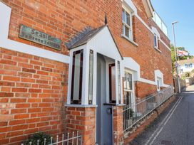 A brick wall and door at Seaside in Lyme Regis