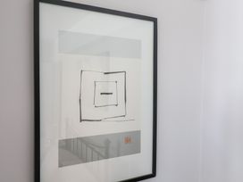 A framed artwork on a wall at Watersmeet in Lyme Regis