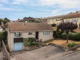 A house with a garage and yard at Gosling Way Lyme Regis