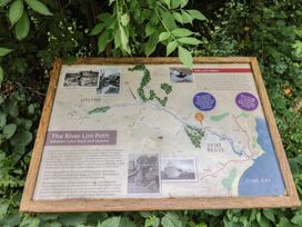 A map and information board about the River Lim Path between Lyme Regis and Uplyme at High Trees Lyme Regis