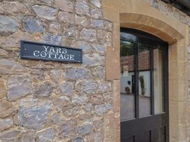 An entryway with a sign reading Yard Cottage at Yard Cottage in Rousdon