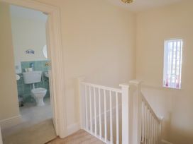 A staircase leading to a bathroom at Greystones in Lyme Regis