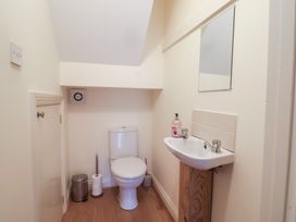 A bathroom with toilet and sink at Greystones in Lyme Regis