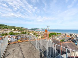 A rooftop view overlooking houses and the sea at 2 Hadleigh Villas Lyme Regis