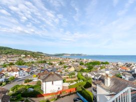 A view of houses and the sea at 2 Hadleigh Villas in Lyme Regis