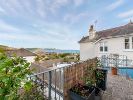 A rooftop view overlooking the sea and nearby houses at 2 Hadleigh Villas Lyme Regis