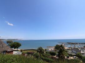 A view of the sea and boats at Penny Plot Cottage Lyme Regis