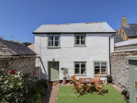 A house with patio furniture at Cleve Cottage in Lyme Regis