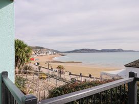 A view of the beach and ocean at 1 Wellhayes Lyme Regis