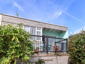 A house with a deck and railings at 1 Wellhayes Lyme Regis