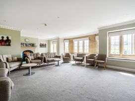 A living room with sofas and armchairs at Harcombe House Accessible Pet Free Bungalow Sleeps 5 Chudleigh