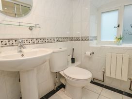 A bathroom with a sink and toilet at The Grain Store in Weymouth