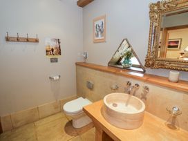 A bathroom with a sink and toilet at Rookery Hall, Middle Hill near Broadway
