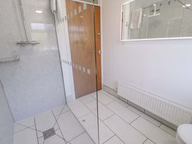 A bathroom with a shower and toilet at Trem Y Foel in Penrhyndeudraeth